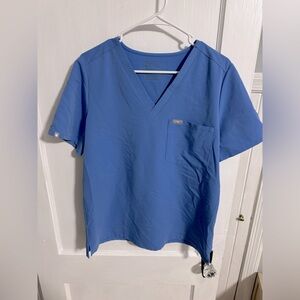 Figs. One pocket top. Large. Tags still on.